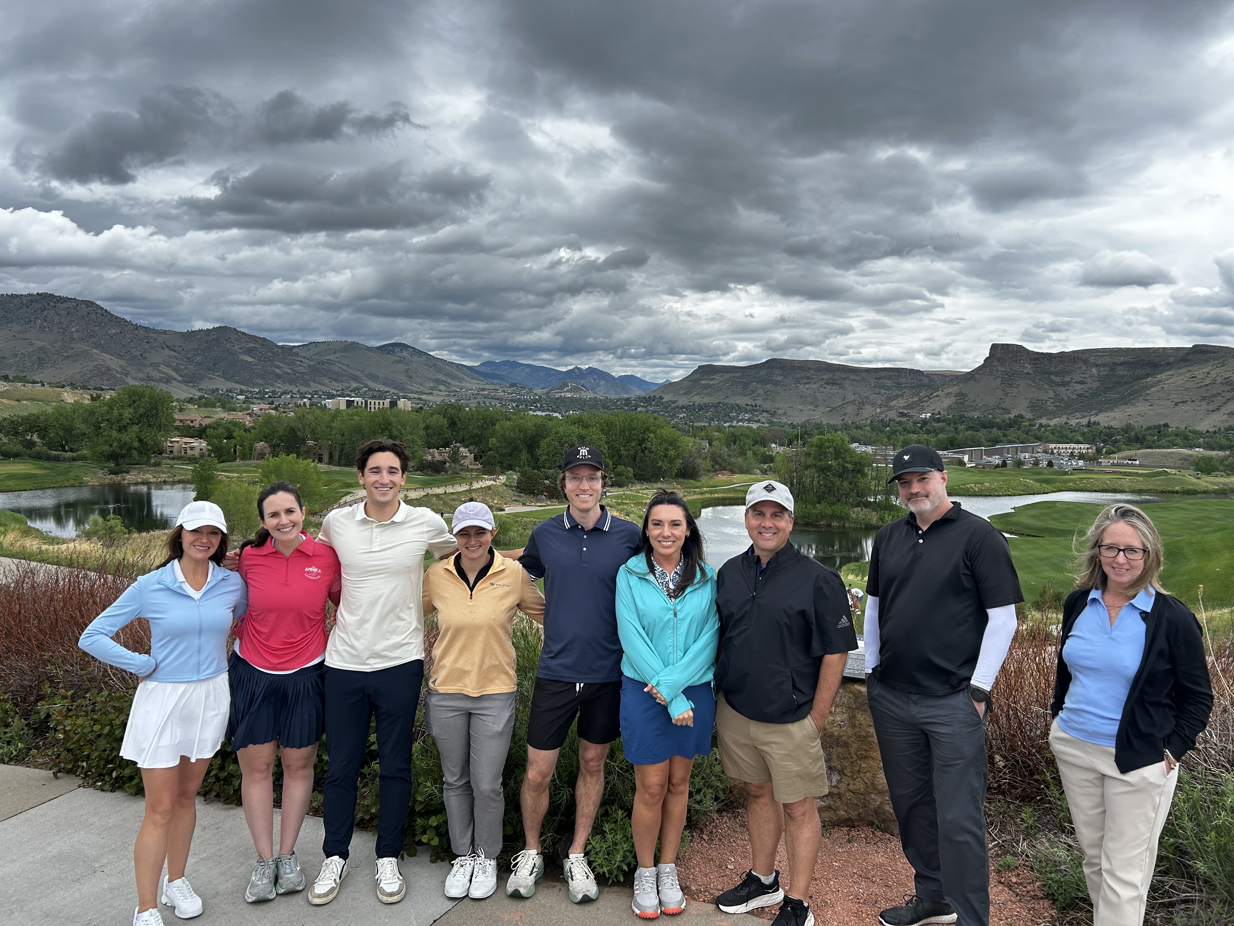 Volta golf outing group photo against the Colorado Rockies